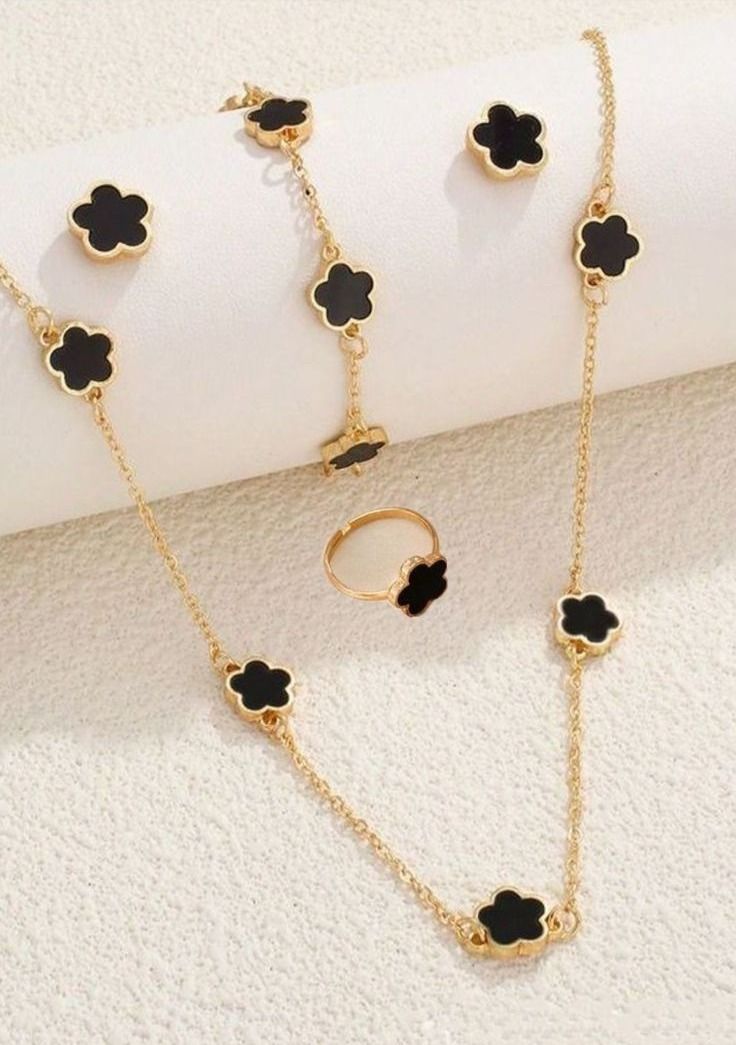 Set trang sức cỏ 4 lá xà cừ đen