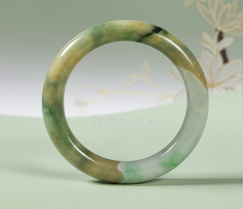 Sự giao thoa giữa các sắc độ ngọc tự nhiên tượng trưng cho Phúc - Lộc - Thọ, mang lại năng lượng tích cực và sự viên mãn.